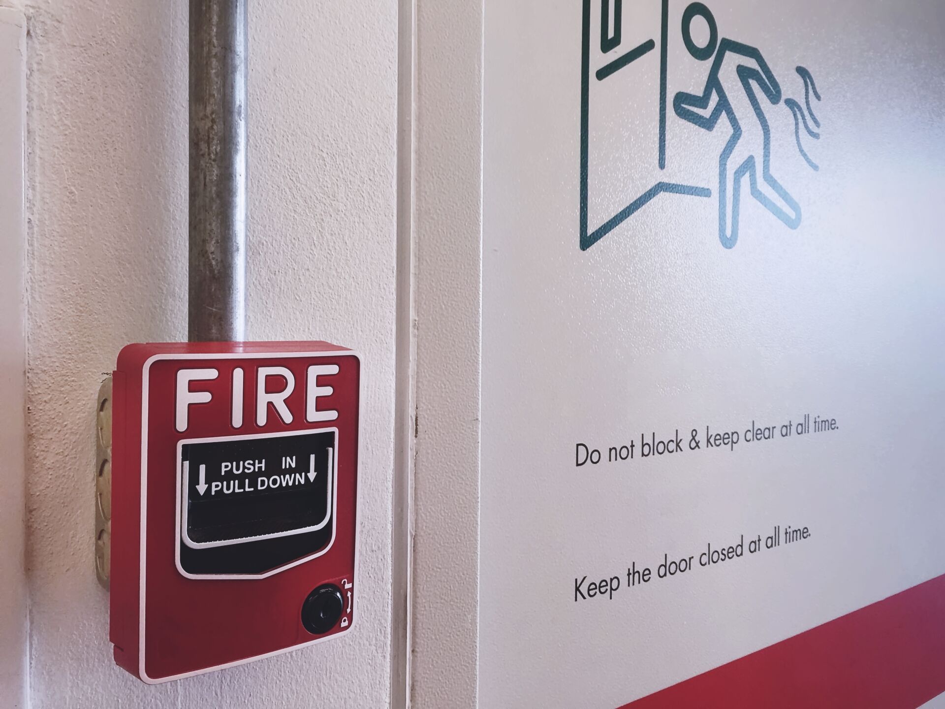 Professional commercial fire safety signage and alarm testing by Local Maintenance Services