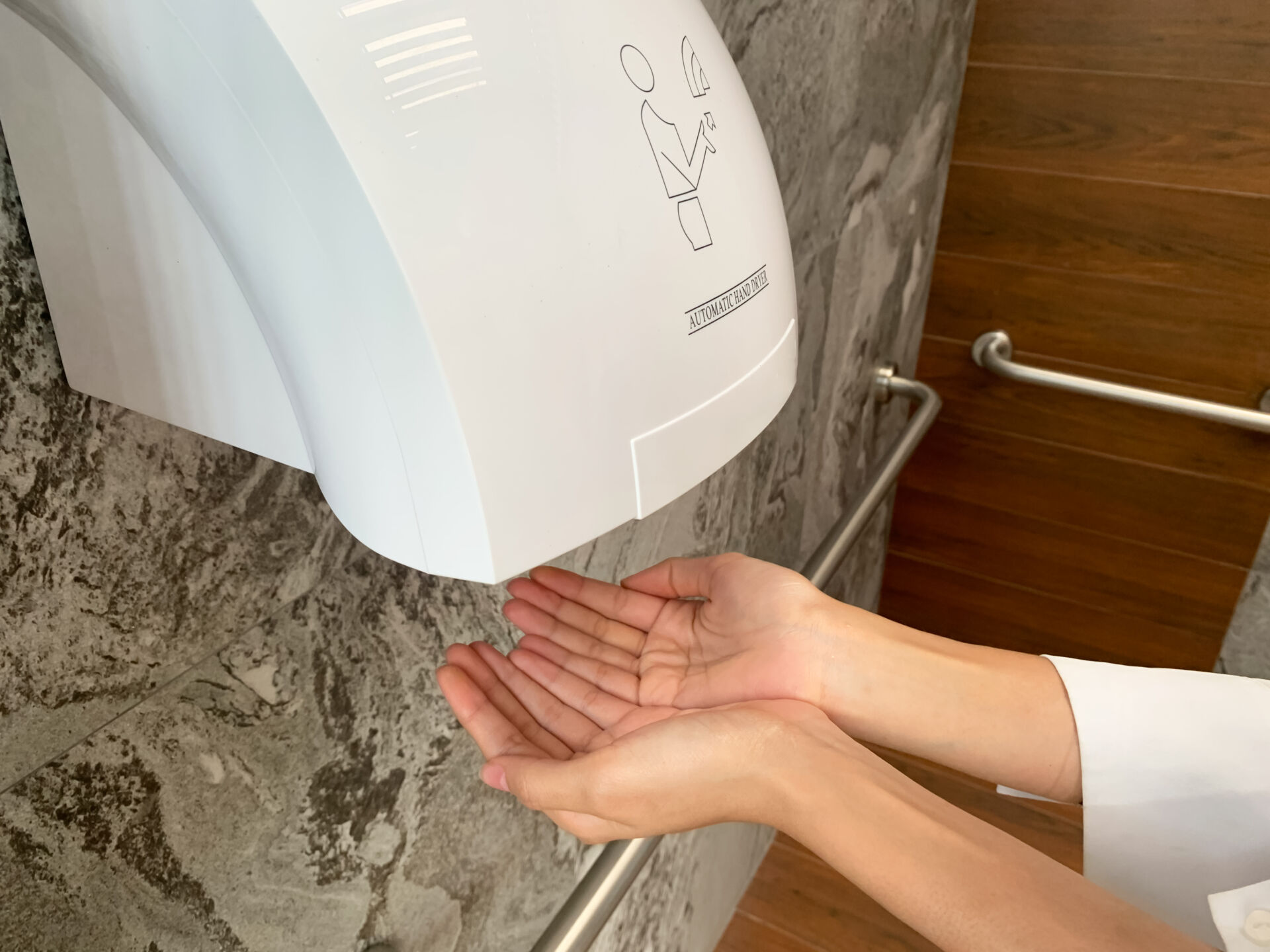 Professional hand dryer and dispenser fitting by Local Maintenance Services