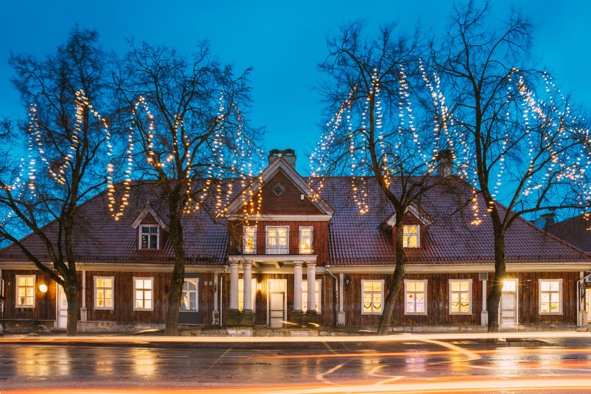 Local Maintenance Services installing outdoor Christmas lights